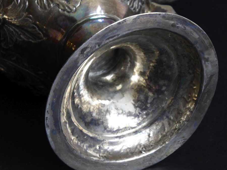 An 18th century hallmarked silver two-handled trophy-style cup; later Repoussé decorated and with - Image 4 of 11