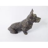 A well modelled and heavy patinated bronze model of a seated Scottie dog (approx. 368g, 9.75cm