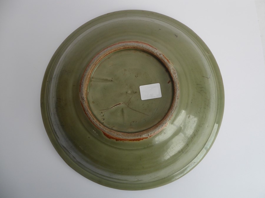 A large early 17th century Chinese Longquan bowl with celadon glaze; the moulded lip above a - Image 3 of 5