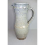 Ray Finch (British, 1914-2012) studio pottery - a reglazed jug with applied handle and incised