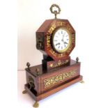 An early 19th century rosewood and brass inlaid eight-day mantle clock; the white-enamel dial with