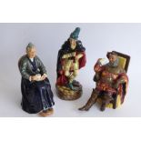 Three hand-decorated Royal Doulton porcelain figures: 'The Foaming Quart' (H.N.2162) 1954, 'The Pied