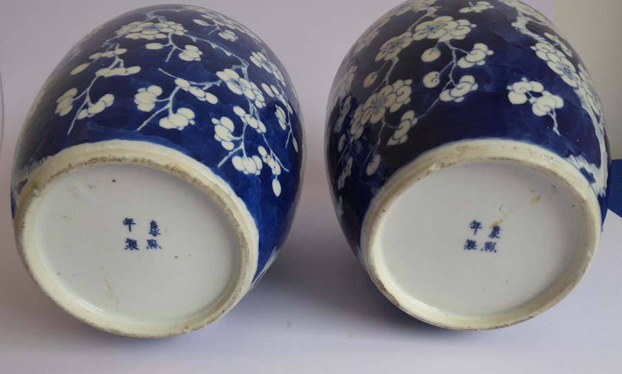 A pair of late 19th century Chinese baluster-shaped vases in Kangxi-style (one minus lid); each - Image 4 of 4