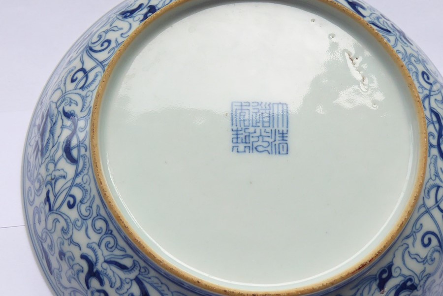 A circular Chinese porcelain blue-and-white dish; six-character mark of Daoguang and of the - Image 17 of 20