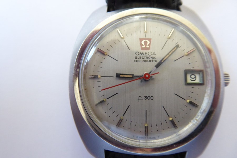 A gentleman's Omega Electronic Chronometer f 300 steel-cased wristwatch; grey signed dial with baton