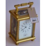 A very fine 19th century gilt-metal-cased and glass-sided carriage clock; the swing carrying