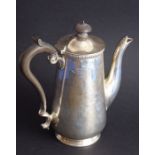 A hallmarked silver coffee pot marked for 'Goldsmiths & Silversmiths Co., Regent Street', assayed