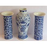 A pair of 19th century Chinese porcelain sleeve vases in Kangxi style; decorated in underglaze blue,