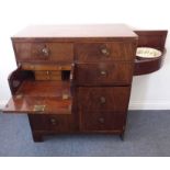 An unusual early 19th century caddy top campaign chest; the top section with single half-width