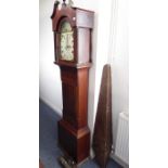 An early 19th century mahogany and boxwood-strung eight-day longcase clock; the broken swan-neck