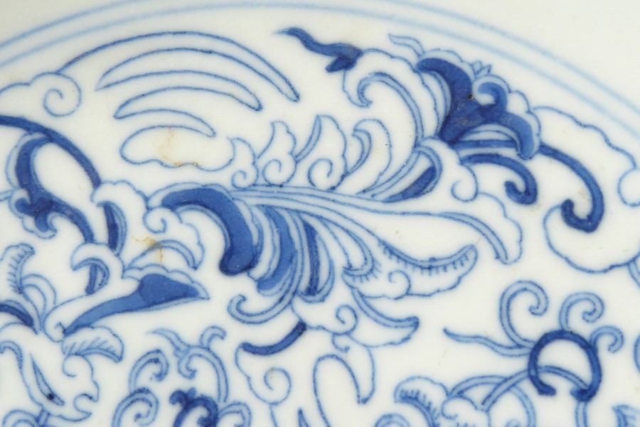 A circular Chinese porcelain blue-and-white dish; six-character mark of Daoguang and of the - Image 12 of 20