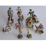 A selection of mainly late 19th century Continental hand-decorated porcelain figure models; to