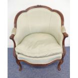 A good 19th century walnut and upholstered armchair in mid 19th century Louis XV-style; the top rail