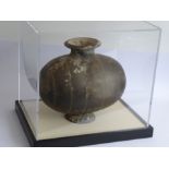 A Chinese Han Dynasty (206 BC - AD 220) incised cocoon jar. Grey, flared circular neck with