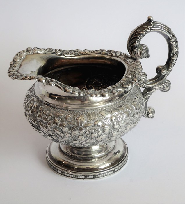 A heavy early 19th century hallmarked silver three-piece tea service: teapot, large two-handled - Image 12 of 13