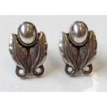 A pair of Danish ear clips by Georg Jensen; of stylised tulip design, the reverse with maker's