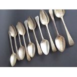 Ten various mostly early 19th century Old English pattern hallmarked silver tablespoons engraved