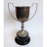 A large two-handled silver plated trophy engraved 'Stepping Stone School Music Makers competition