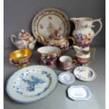An assortment of ceramics to include a large mid-19th century jug hand-decorated with insects and