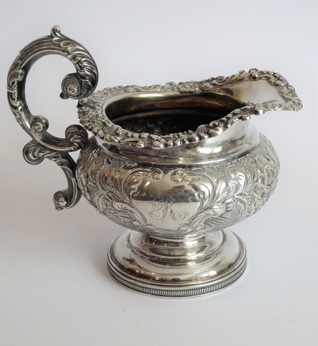 A heavy early 19th century hallmarked silver three-piece tea service: teapot, large two-handled - Image 10 of 13