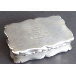 A heavy silver snuff box;  full length vesta rasp to the underside, engraved armorial to the lid,