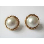 A pair of mabé pearl and 18-carat yellow-gold ear clips each comprising a mabé pearl measuring