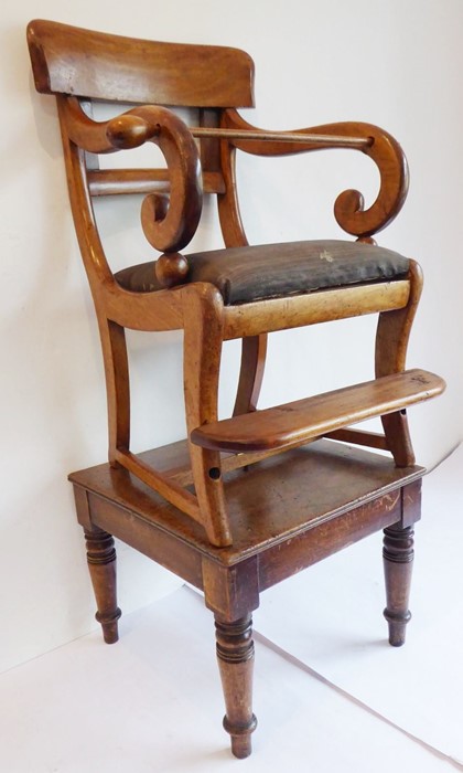 A late Regency-period child's mahogany highchair on stand; tablet-shaped top-rail, scrolling arms