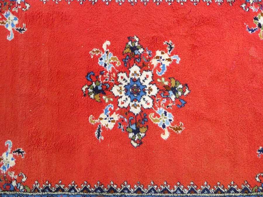 A Moroccan Rabat carpet; central flowerheads against a red ground within blue and red varying - Image 3 of 5