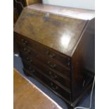 A good late 18th century mahogany writing bureau; the crossbanded fall opening to reveal fully