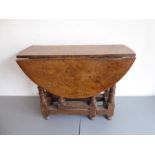 A small dropleaf oval oak gateleg table; in 17th century style (probably late 19th century) and of