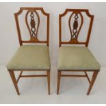 A good pair of late 19th / early 20th century satinwood and marquetry bedroom chairs in Sheraton