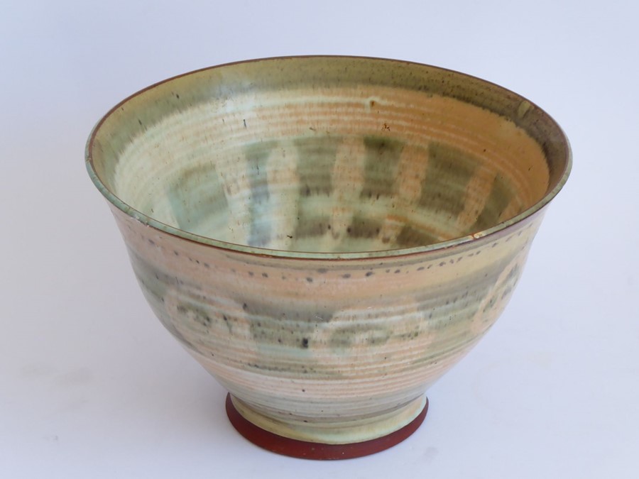 An interesting Studio pottery bowl; the slightly flaring lip above a horizontal reeded body