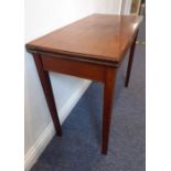 A late 18th century George III period fold-over top mahogany tea table; raised on square slightly