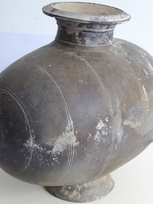 A Chinese Han Dynasty (206 BC - AD 220) incised cocoon jar. Grey, flared circular neck with - Image 6 of 10