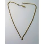 A filed belcher link chain necklace, stamped '18K' suspending a coronet-side brilliant-cut