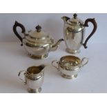 A good and heavy hallmarked silver four-piece tea service comprising teapot, hot-water jug, two-