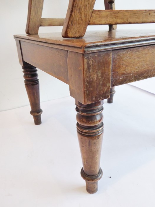 A late Regency-period child's mahogany highchair on stand; tablet-shaped top-rail, scrolling arms - Image 10 of 13