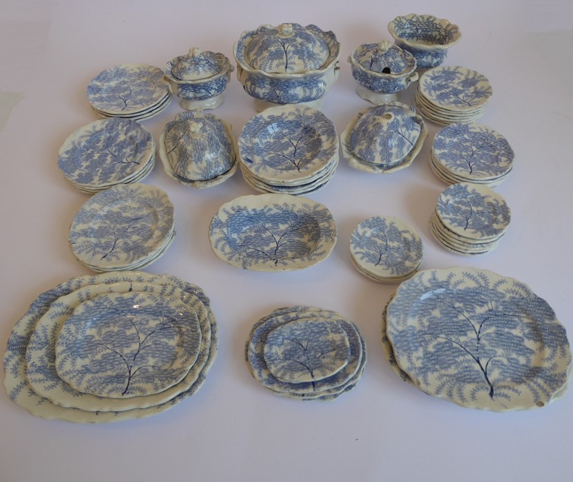 A large collection of 19th century blue and white miniature dolls' house china; to include lidded