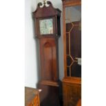 An early 19th century oak and mahogany cased thirty-hour longcase clock; the broken swan-neck