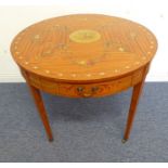 A good late 19th / early 20th century satinwood and painted drum table; top centrally decorated with