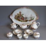 A 19th century Meissen porcelain cabaret set: a two-handled tray, bullet-shaped teapot, coffee