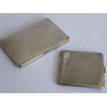 Two heavy early 20th century hallmarked silver cigarette cases: each with Birmingham assay marks and