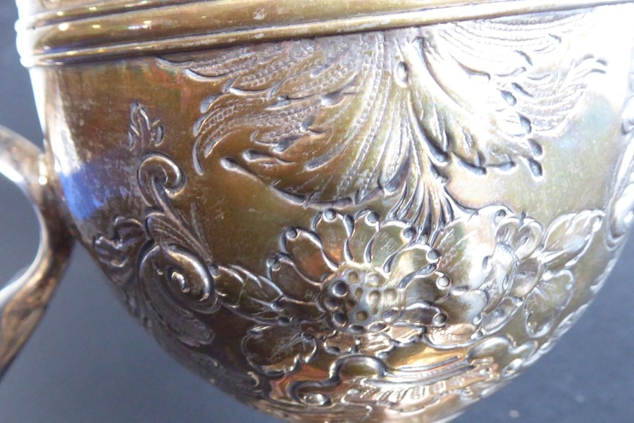 An 18th century hallmarked silver two-handled trophy-style cup; later Repoussé decorated and with - Image 5 of 11