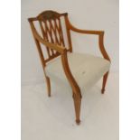 A late 19th century painted satinwood open armchair in the Sheraton Revival style: the floral