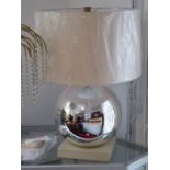 A Baker Mercurial table lamp by Bill Solfield: a large 13" silver mercury glass globe supported on a