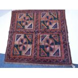 Ersari Turkmen tribal rug; circa 1900, of predominately dark terracotta ground with four square
