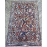 A south-west Persia Qashqai rug of very fine quality; circa 1880, decoration of stylised trees and