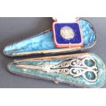 A pair of 19th century silver-plated grape scissors, ornately pierced with anthemion-style motifs (