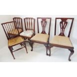 Two pairs and a single chair: a pair of mid 18th century mahogany side chairs, pierced vase-shaped