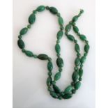 A green hardstone necklace
